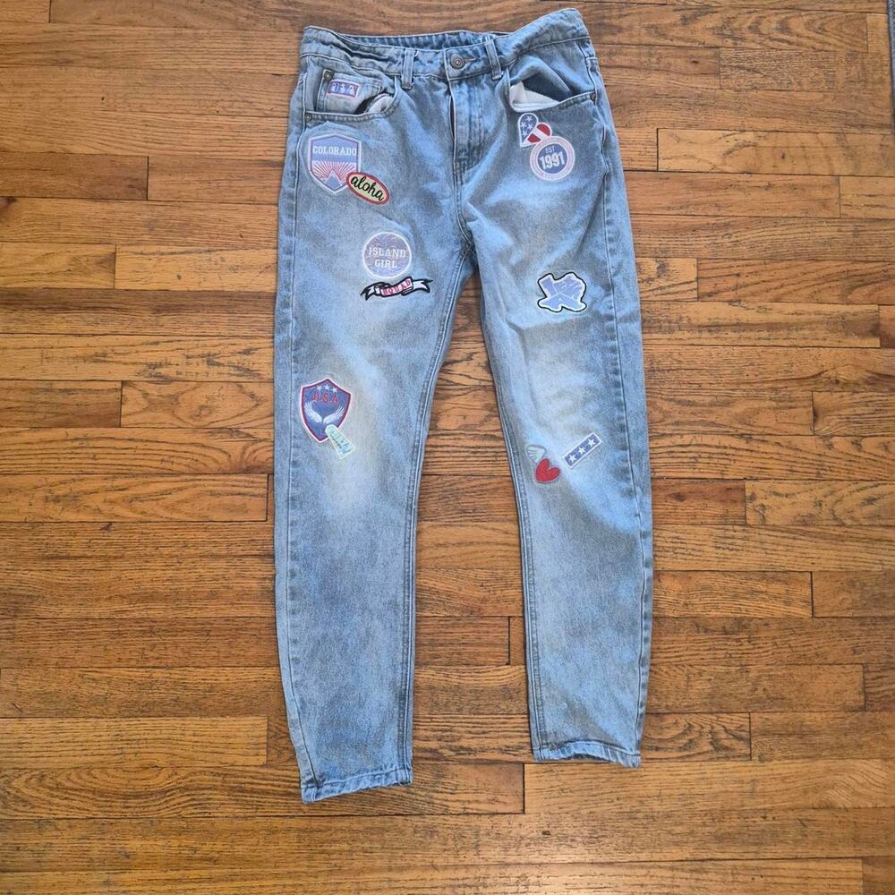 The outfitter mid rise light wash jeans